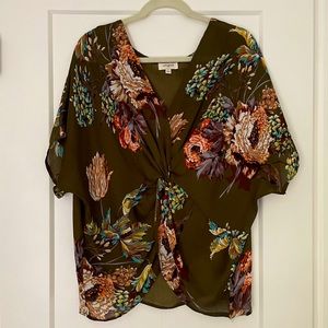 Flowy oversized v-neck twist front top